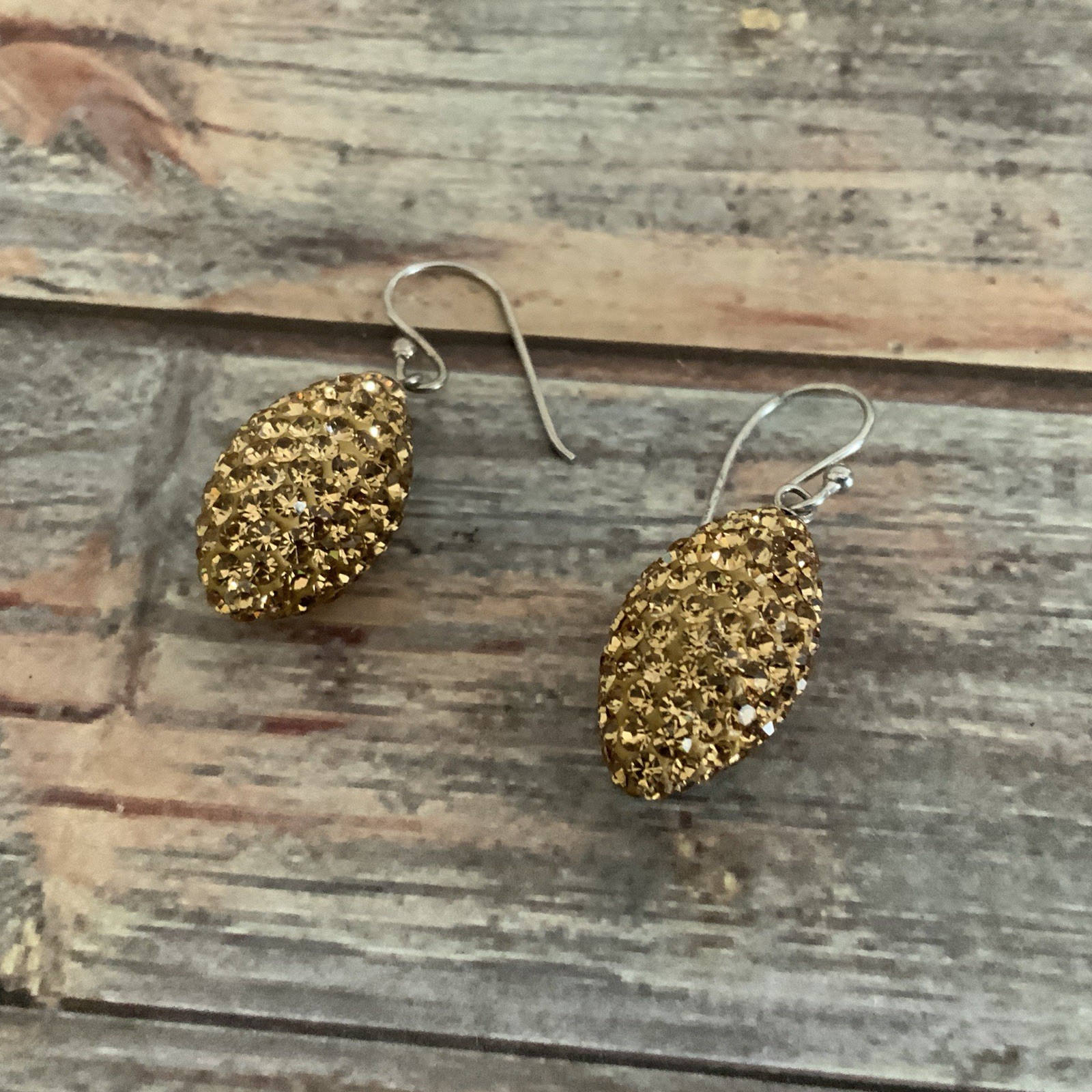 Pave rhinestone champagne colored pierced earrings