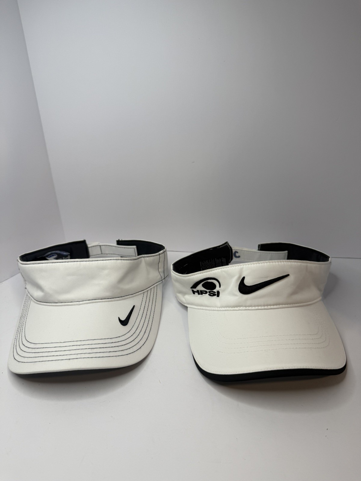SET OF NIKE White GOLF VISORS UNISEX ONESIZE ADJUSTABLE With Logos