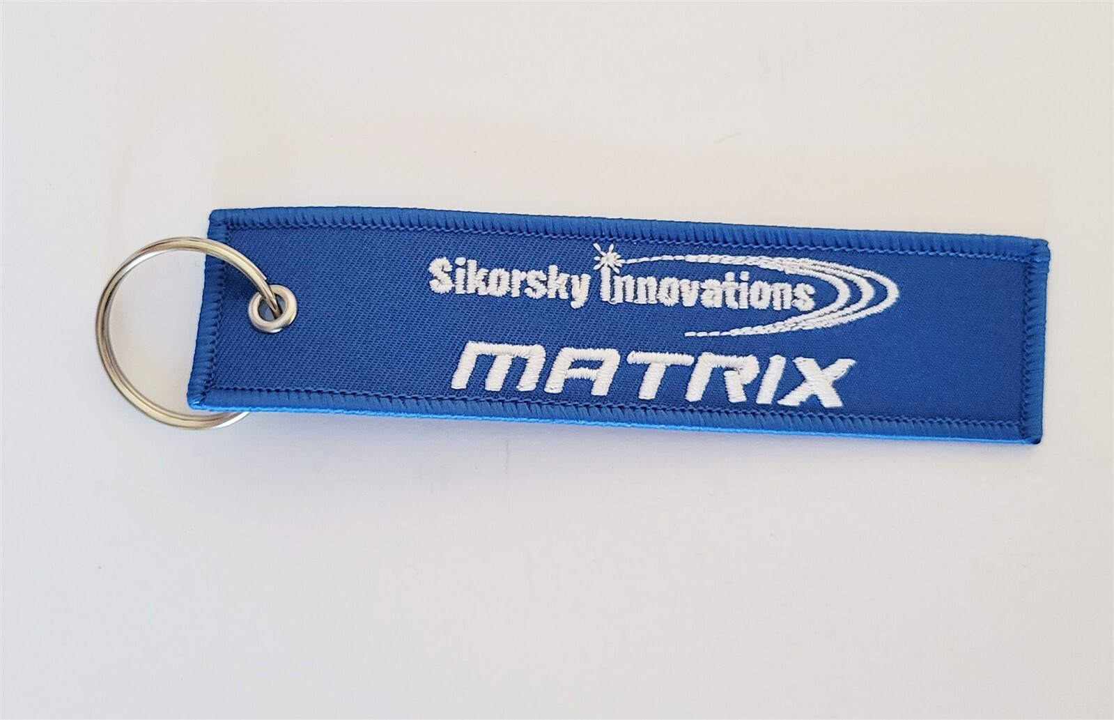 Matrix Sikorsky Innovations / Install Before Flight Blue Tag Keychain Military