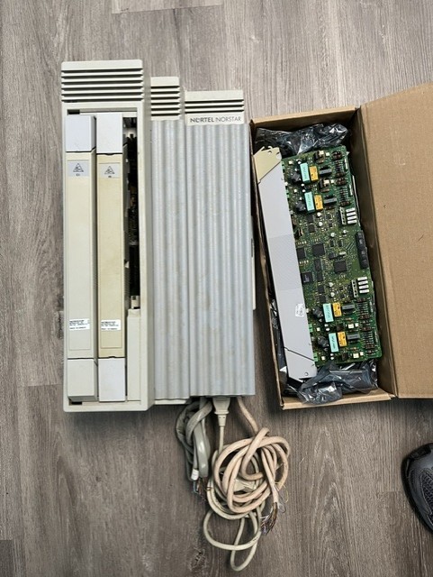 Nortel Norstar Plus Modular ICS Phone System w/  extra card and 4 phones.