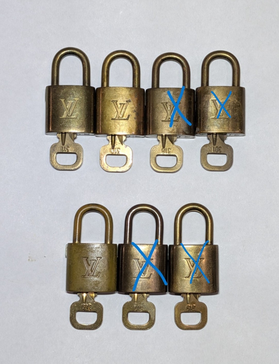Louis Vuitton Lock and Key Set Vintage