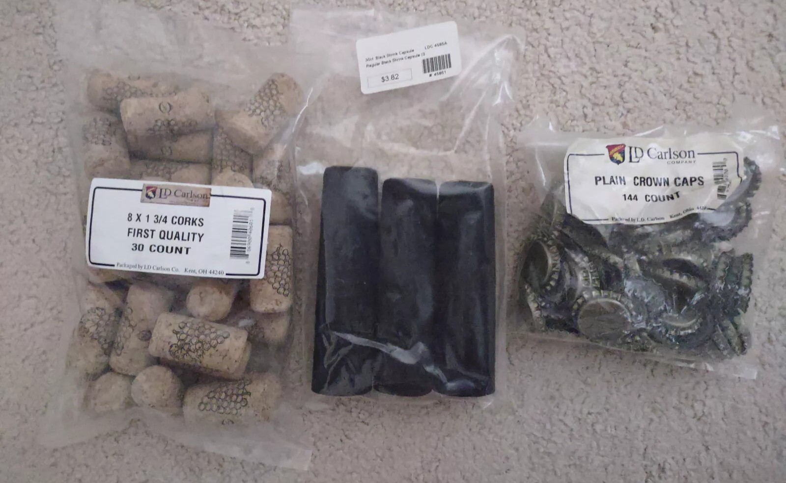 30 LD Carlson Corks; 30 Black  Shrink Capsules; ~80 LD Carlson Crown Bottle Caps