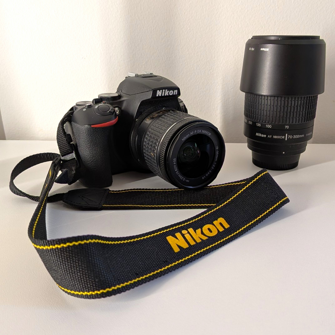 Nikon D5600 DSLR Camera Bundle Black w/ 18-55mm & 70-300mm Lenses, Strap