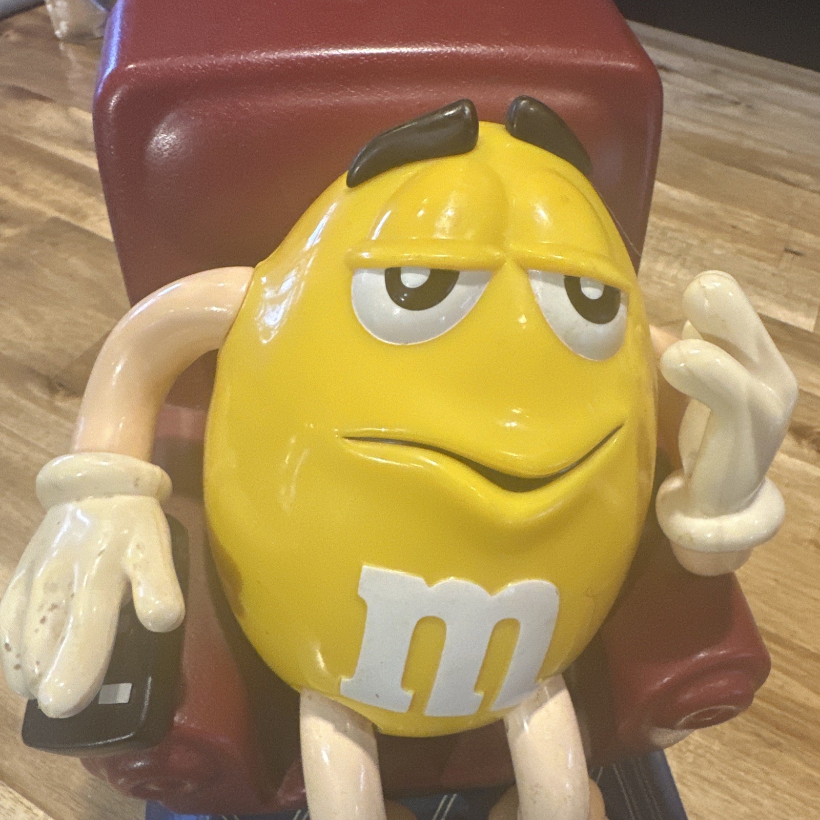 Yellow M&M Lazy Boy candy dispenser