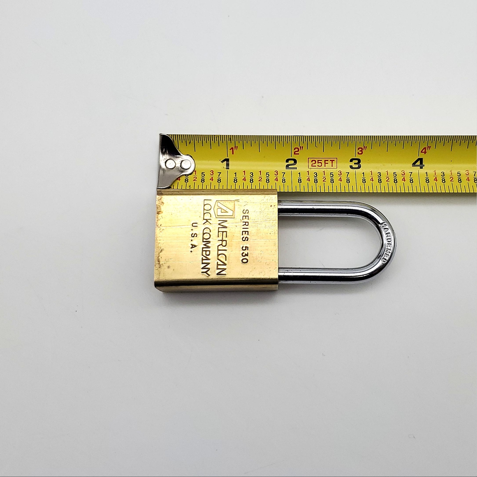 American 530 Padlock Rekeyable 1-5/8"L x 1/4"D Shackle 1-3/8" Brass Body No Core