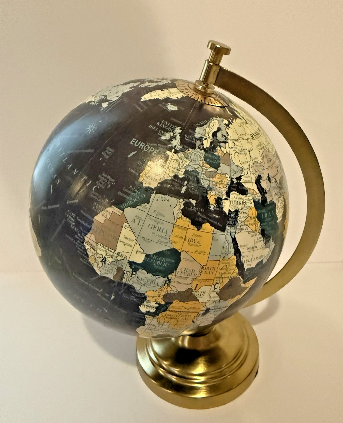 Black Ocean Desktop World Globe with Gold Metal Stand by DesignCo.
