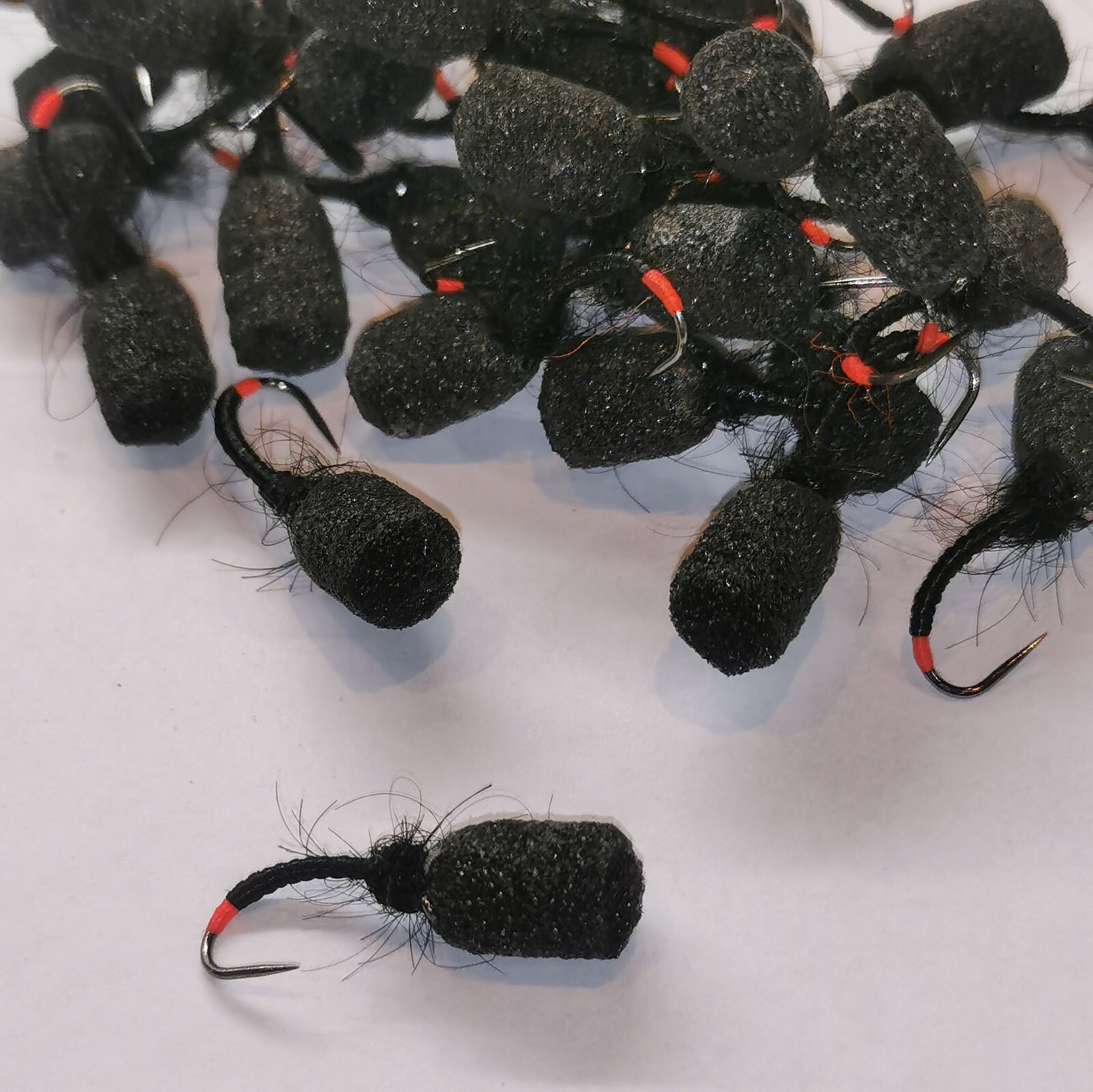 6 Black suspender top hat emerger black foam Buzzer red tag. Trout Fly Fishing