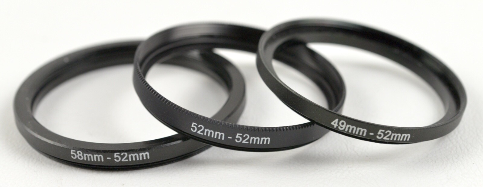 3) Step-rings 58 - 52, 52 - 52 & 49 - 52