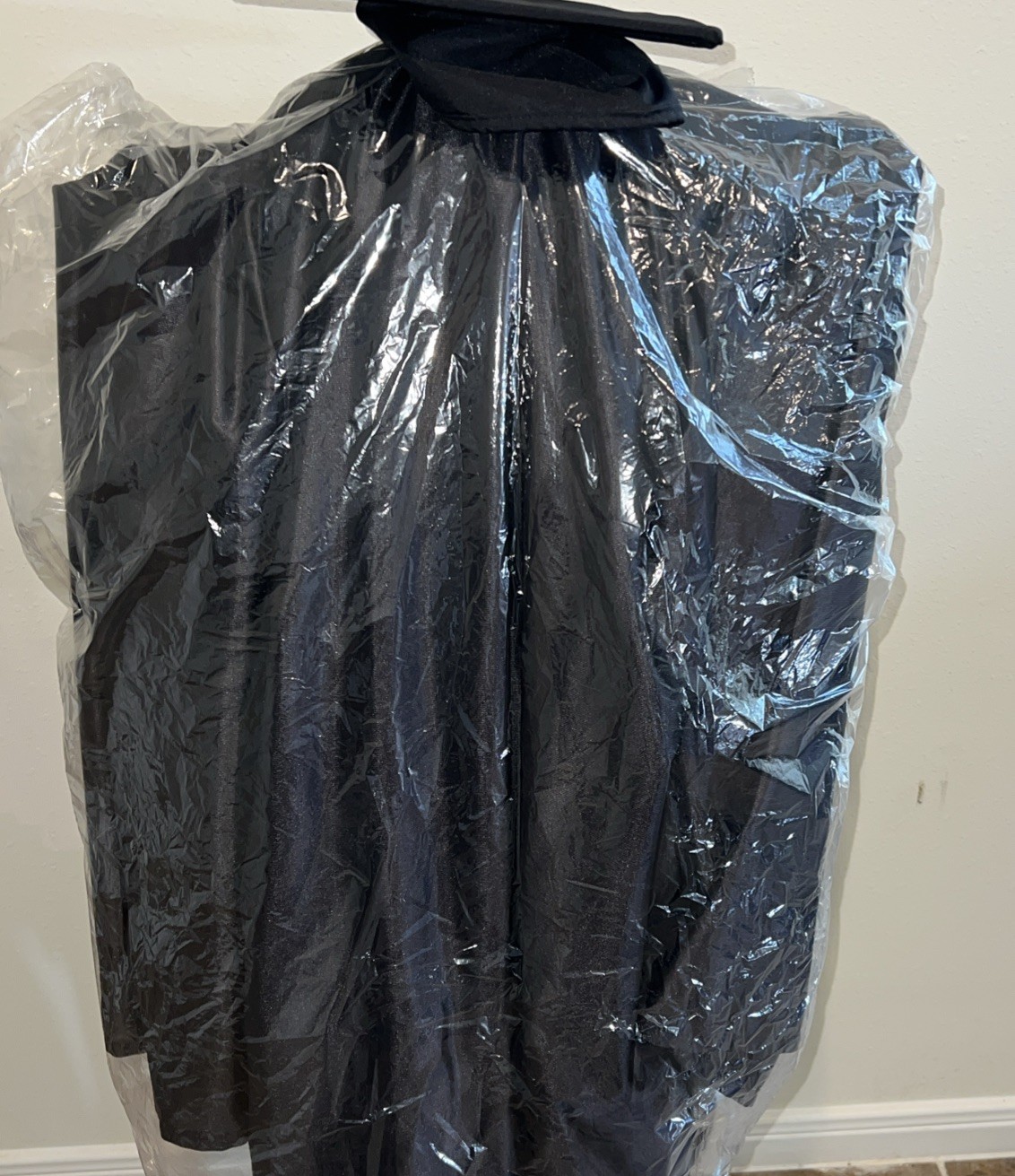 College Graduation Cap And Gown