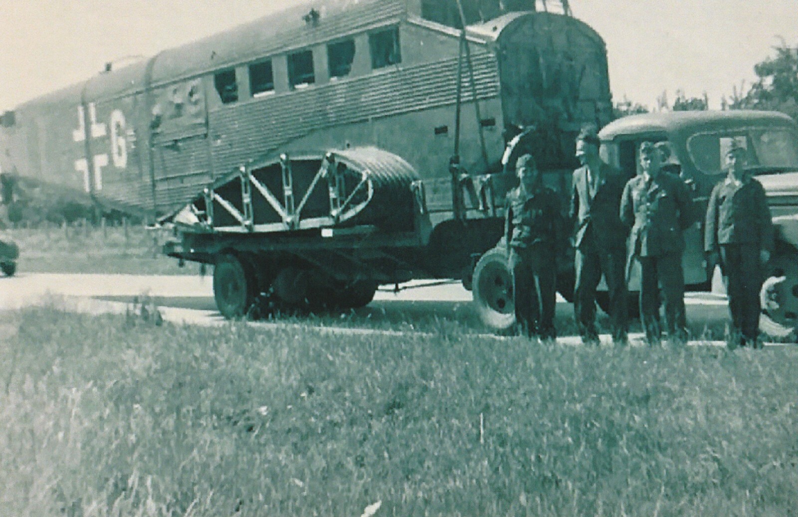 WW II German  Photo --   Junker 52 Being Tranported By Truck