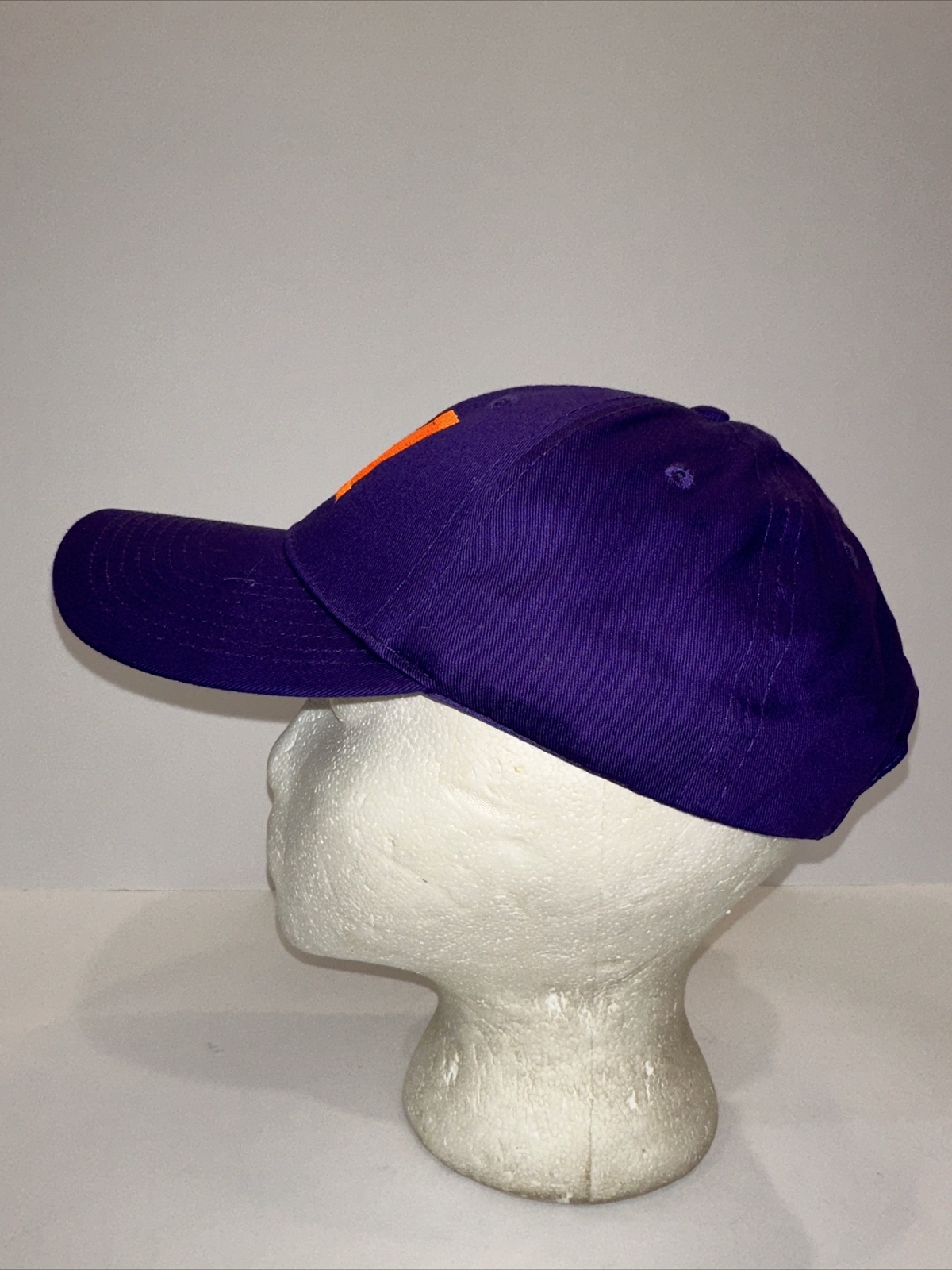 Purple Hat Cap with Orange Capitol M on the front Hook Loop