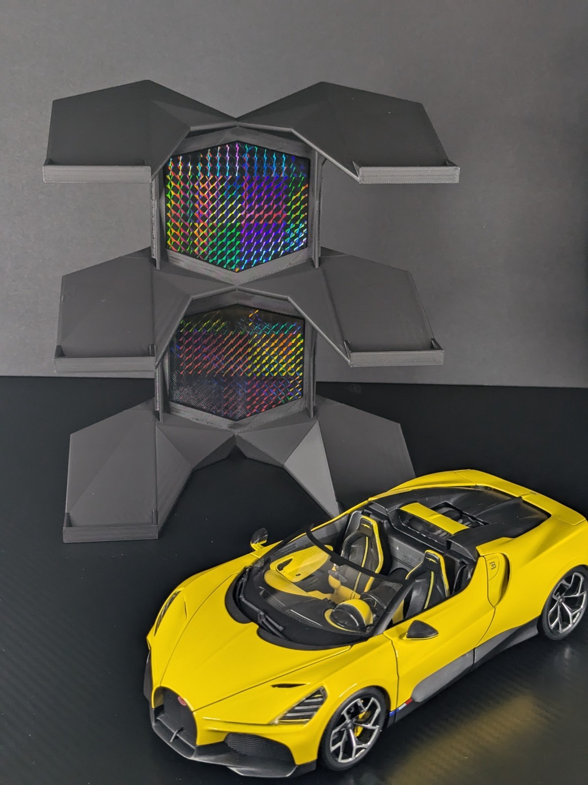 1:18 Scale Car Models Stand – Holds 3 Cars Black with rainbow decorative elemen