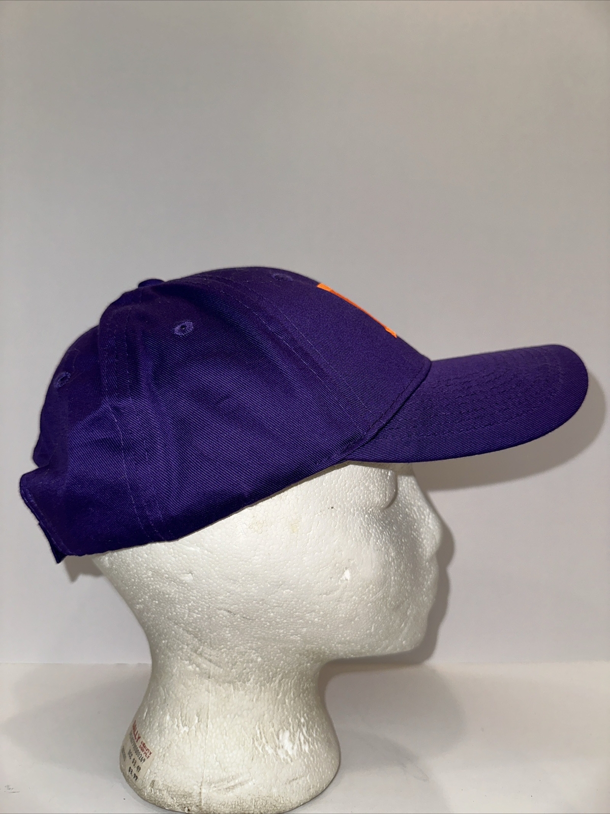 Purple Hat Cap with Orange Capitol M on the front Hook Loop
