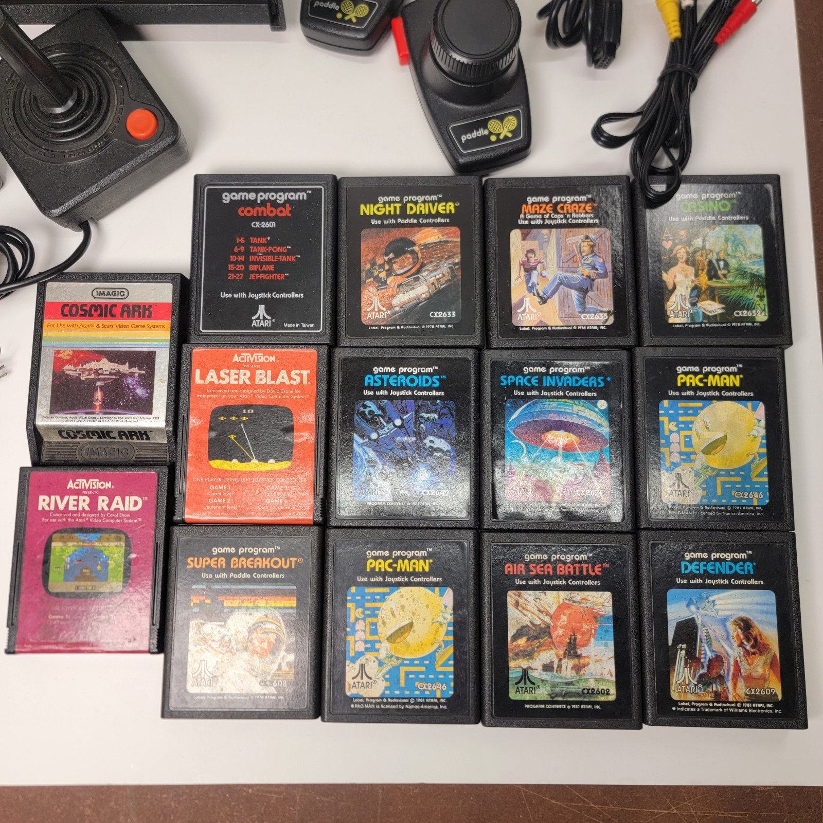 Atari 2600 Console * Controllers * Games ** Large Lot ** Untested
