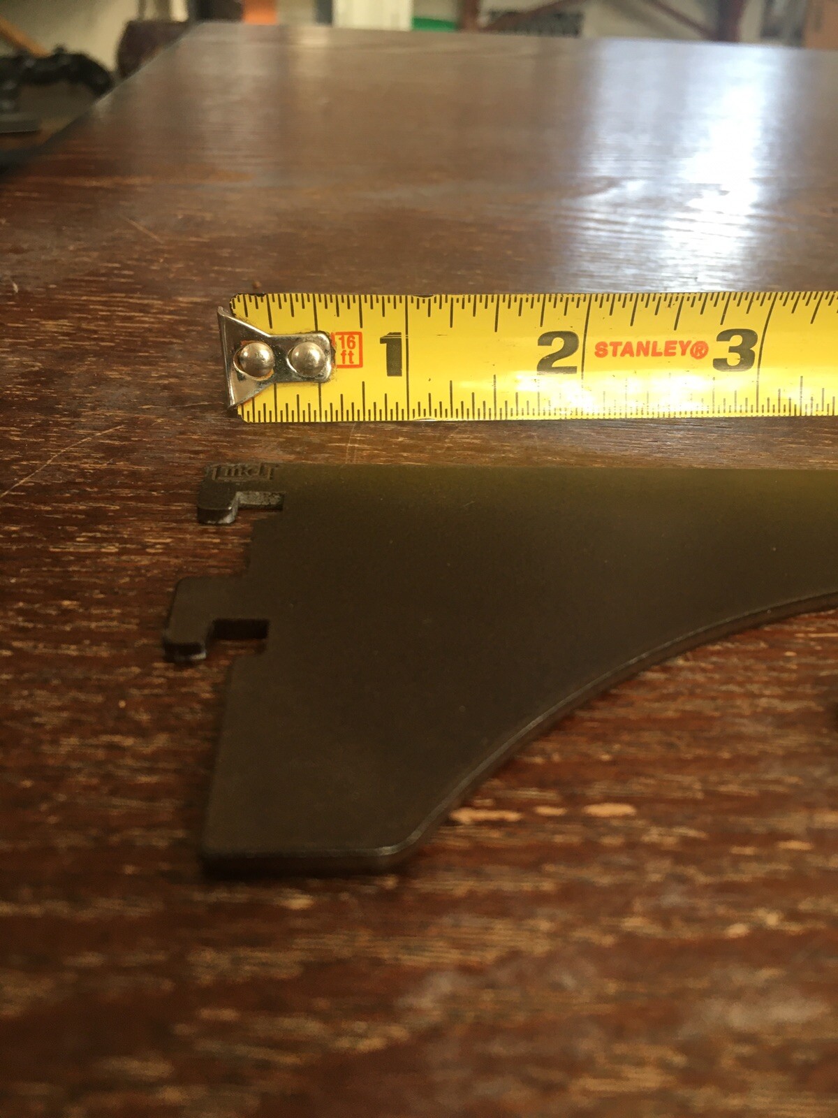 2 brown metal shelf support arms 8" after Slotted.