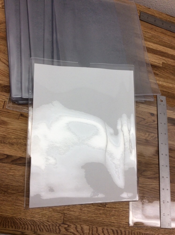 (100) top load clear vinyl Heavy Duty envlopes w/ thumb notch 8.75x11