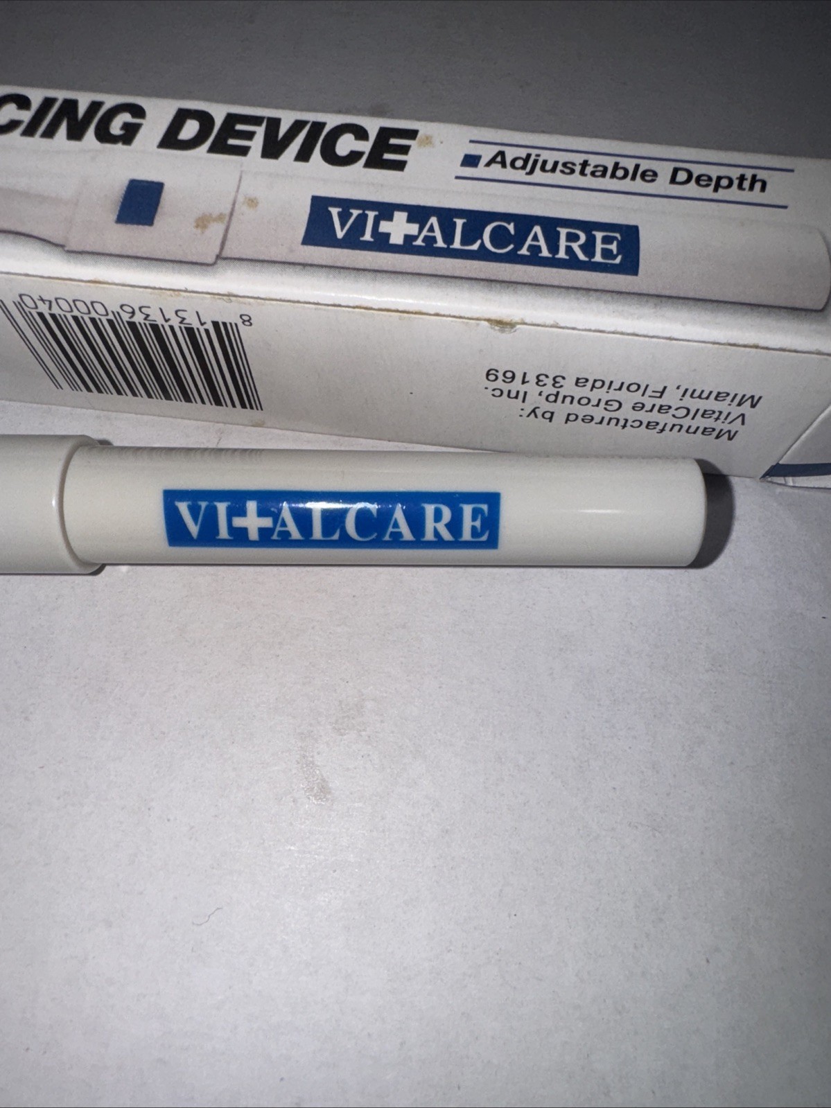 Vital Care Lancing Device With Adjustable Depth