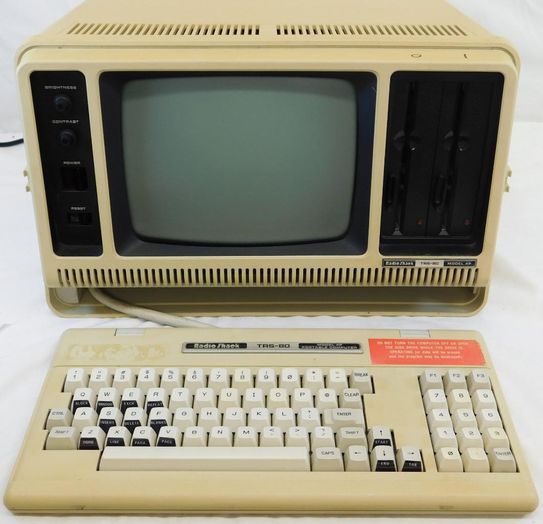 Vintage TRS-80 model 4P computer 26-1080A w/ stickers screen powersUp o/w untstd