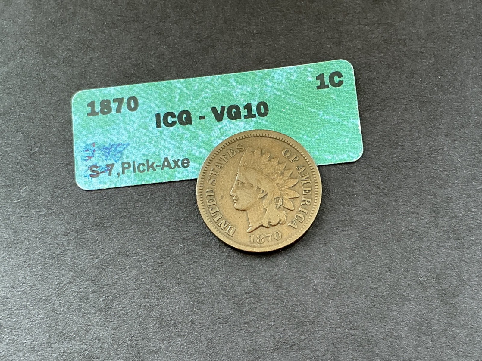 1870 indian head cent “ PICK AXE “. VG-10 choice