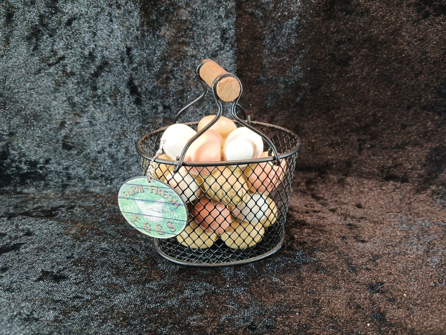 Mini Basket With Eggs Inside Basket Is Made Of Metal
