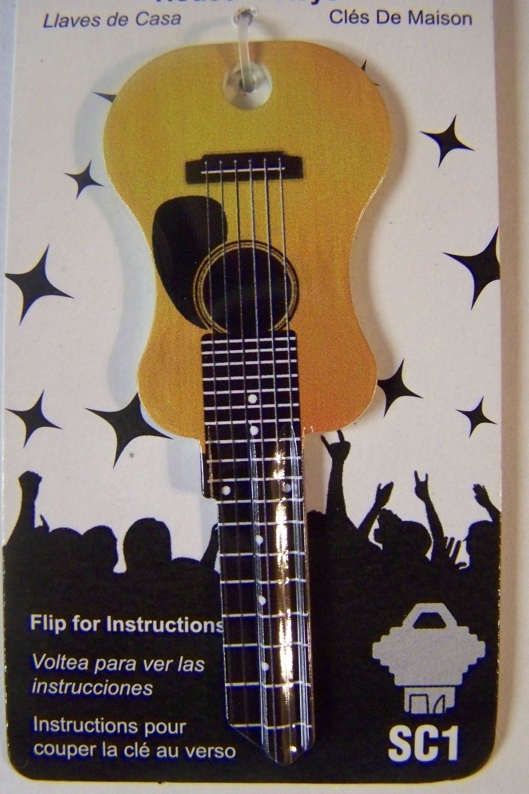 Guitar shape Acoustic Electric Schlage SC1 68 house key blank.