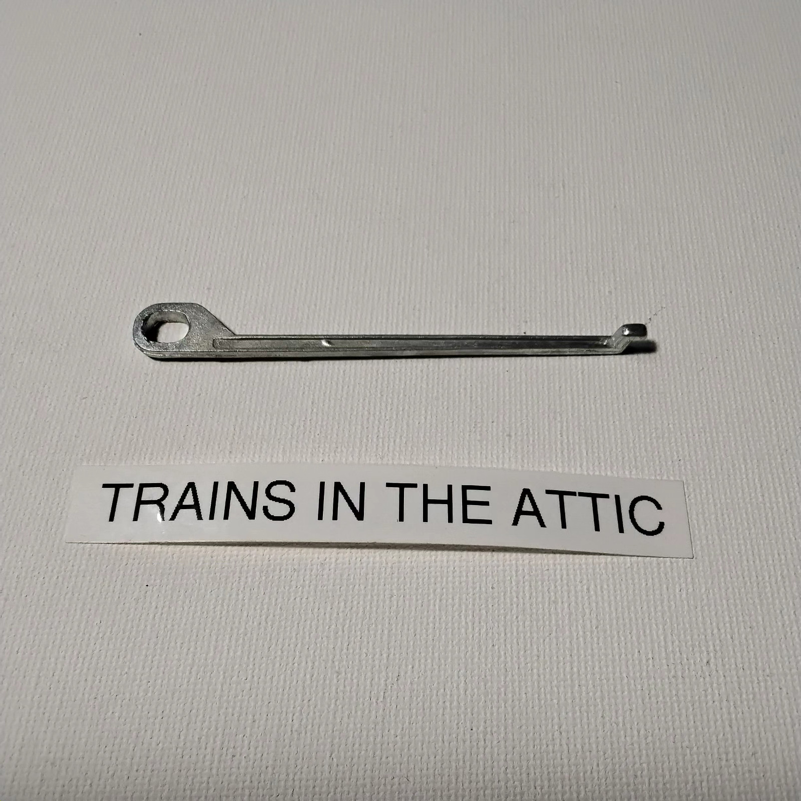 LIONEL 8300-59 LEFT HD ECCENTRIC ROD FOR STEAM LOCO 8502 2-4-0. NEW