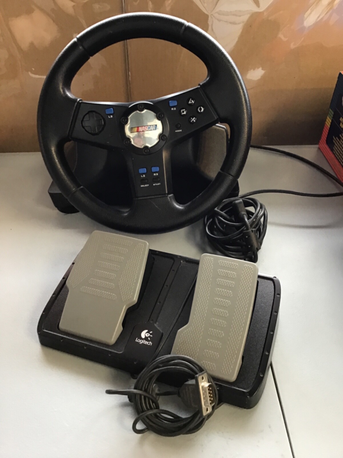 PRE-OWNED LOGITECH NASCAR STEERING WHEEL AND PEDAL PS2 PS3 AND PC COMPATIBLE