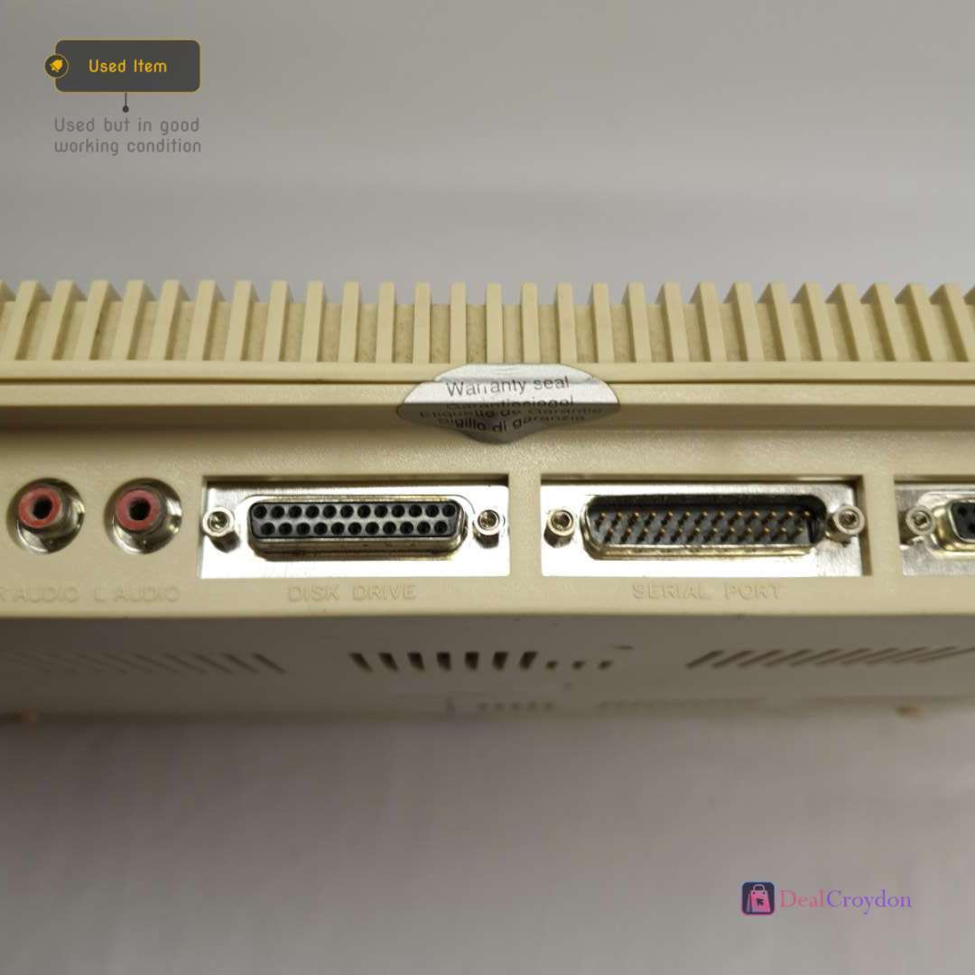 COMMODORE AMIGA A500 COMPUTER +COMMODORE A520 +MOUSE + 10 DISKS + POWER SUPPLY