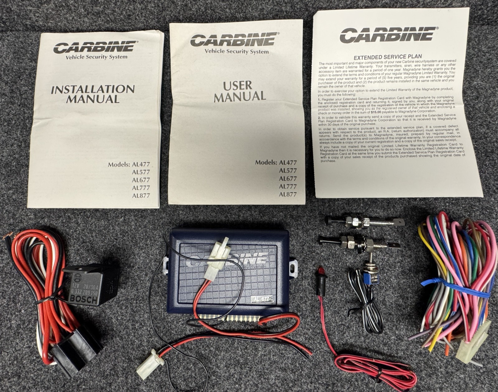 CARBINE MAGNADYNE AL677 ALARM FCC ID: ELV55AAL736RA BRAIN W/WIRES AND RELAY.