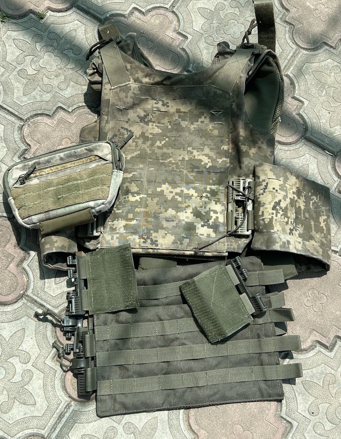 Military body armor with pouches from a trench
