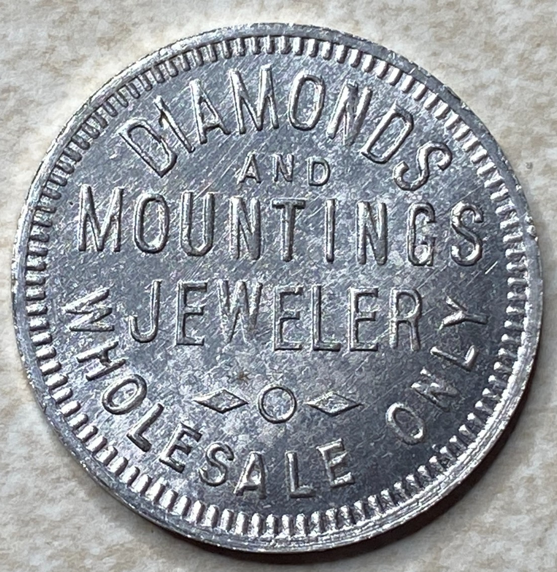 T9140 Diamonds and Mountings Jeweler, Unknown Anillo Restrike Arcade Token