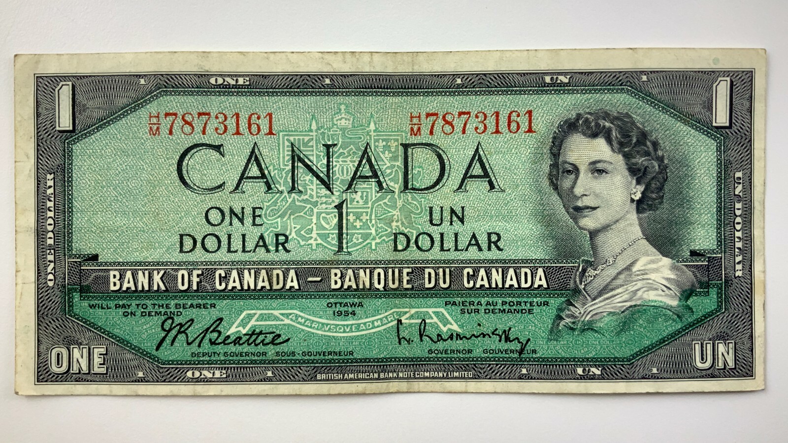 1954 Canada 1 One Dollar Circulated Banknote HM Prefix Beattie Rasminsky Y672