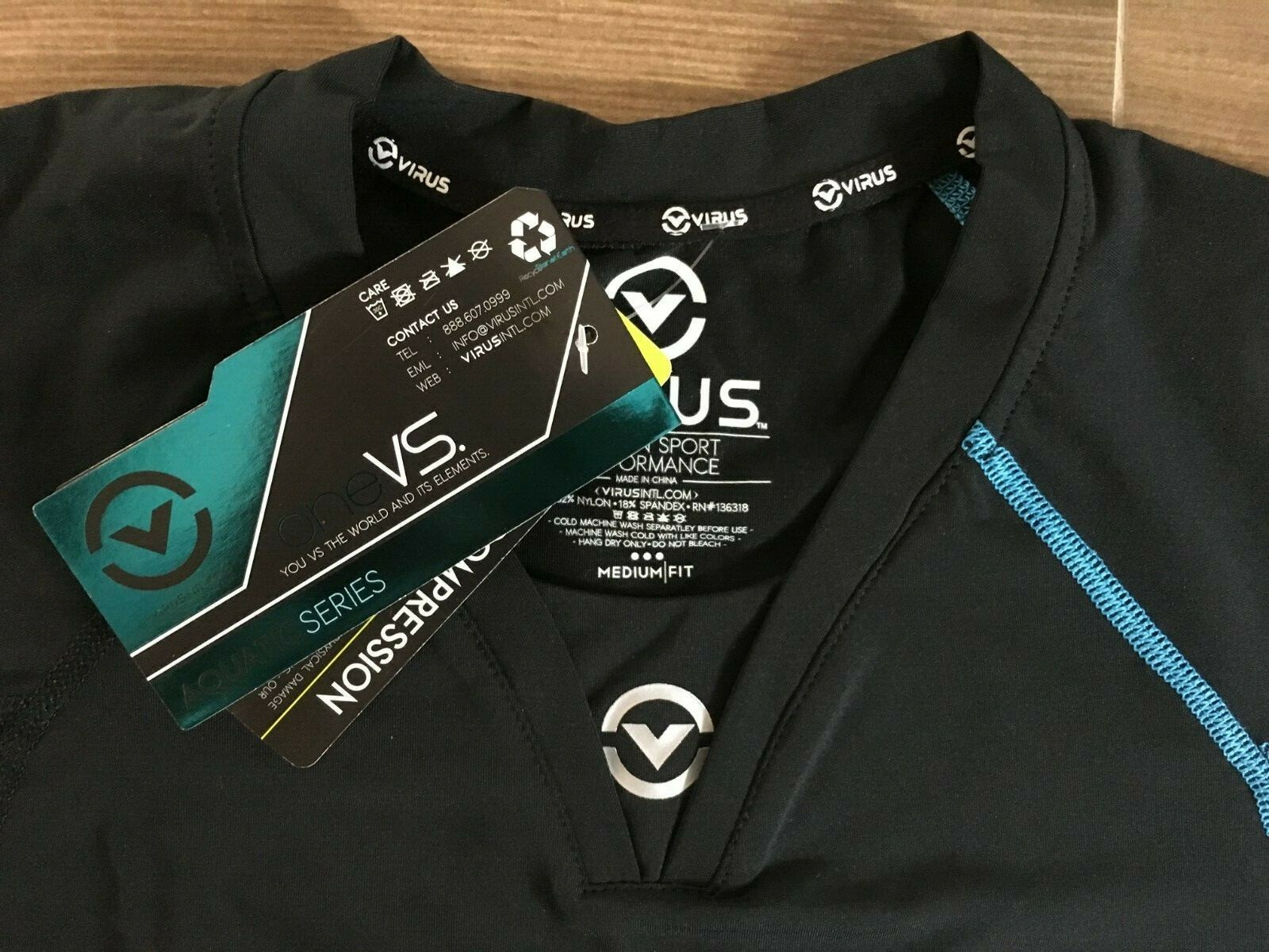 NWT VIRUS AQUATIC SHORT SLEEVE COMPRESSION TOP (MEDIUM)