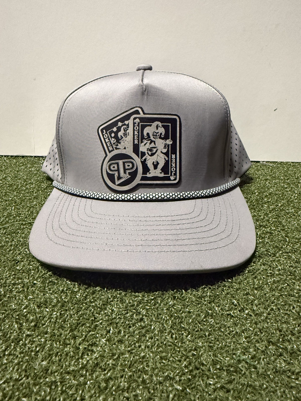 The joker  waterproof snap back golf hat.
