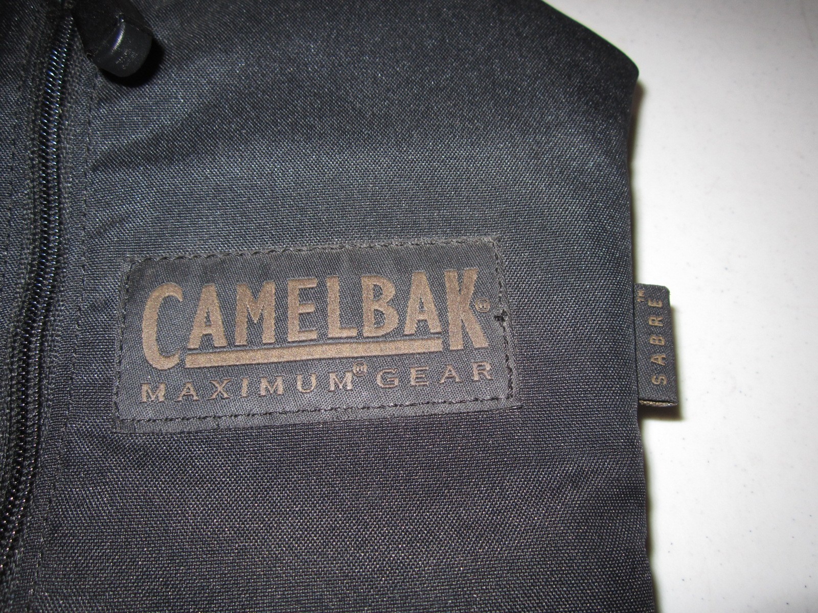 Black Camelbak Sabre Hydration Carrier Pack 70 Ounce 2 Liter Bladder NO INSERT