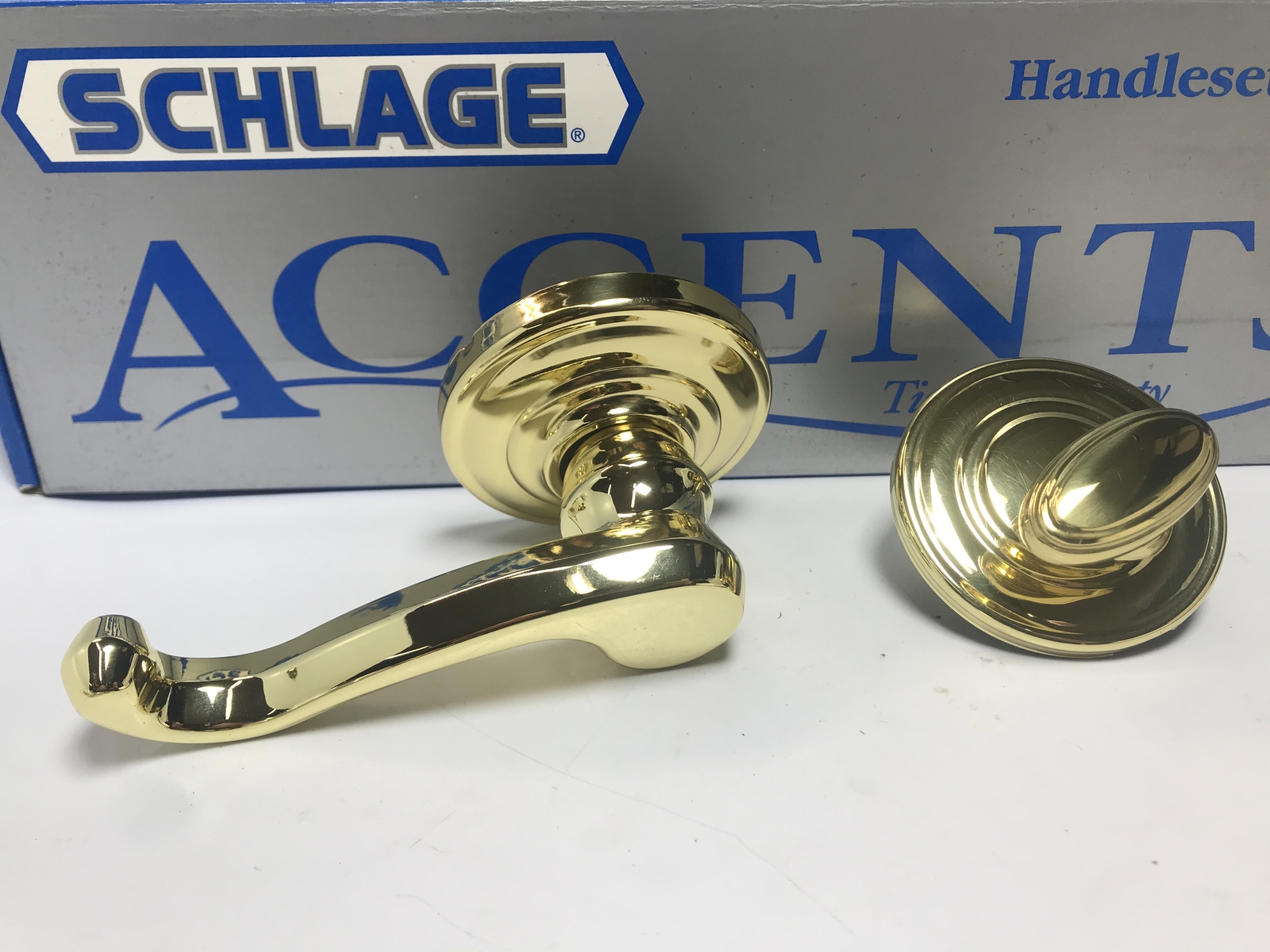 Schlage Callington Interior Left-Handed Lever with Deadbolt - Bright Brass