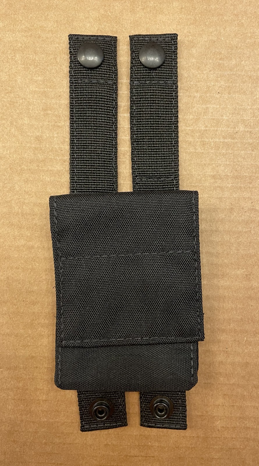 MOLLE handcuff/utility pouch, new approximately 4"x3"x1"