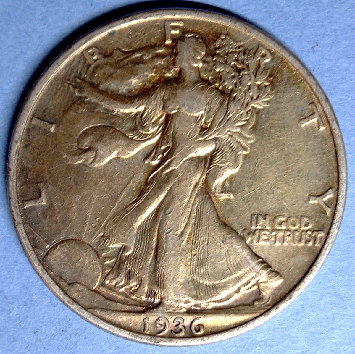 1936 Philadelphia Mint Walking Liberty Half Dollar XF Condition but you grade it