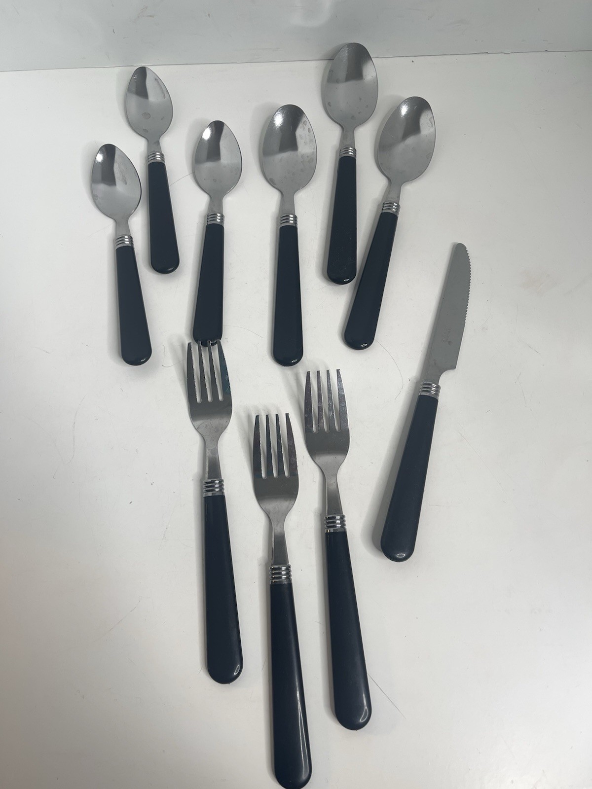 VTG Gibson everyday Flatware Stainless  Black Plastic 10 pieces spoons forks