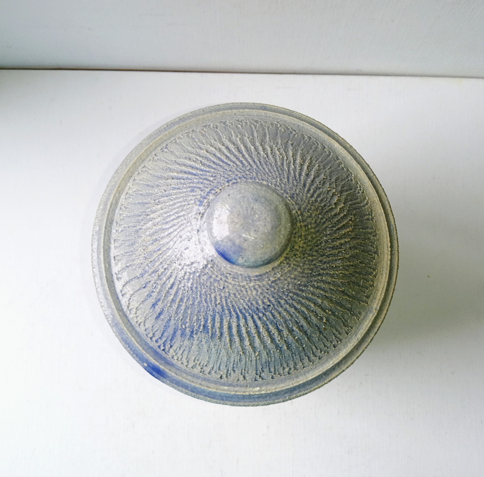 Bowring Ceramics Ginger Jar with lid. Light blue with impressed design.