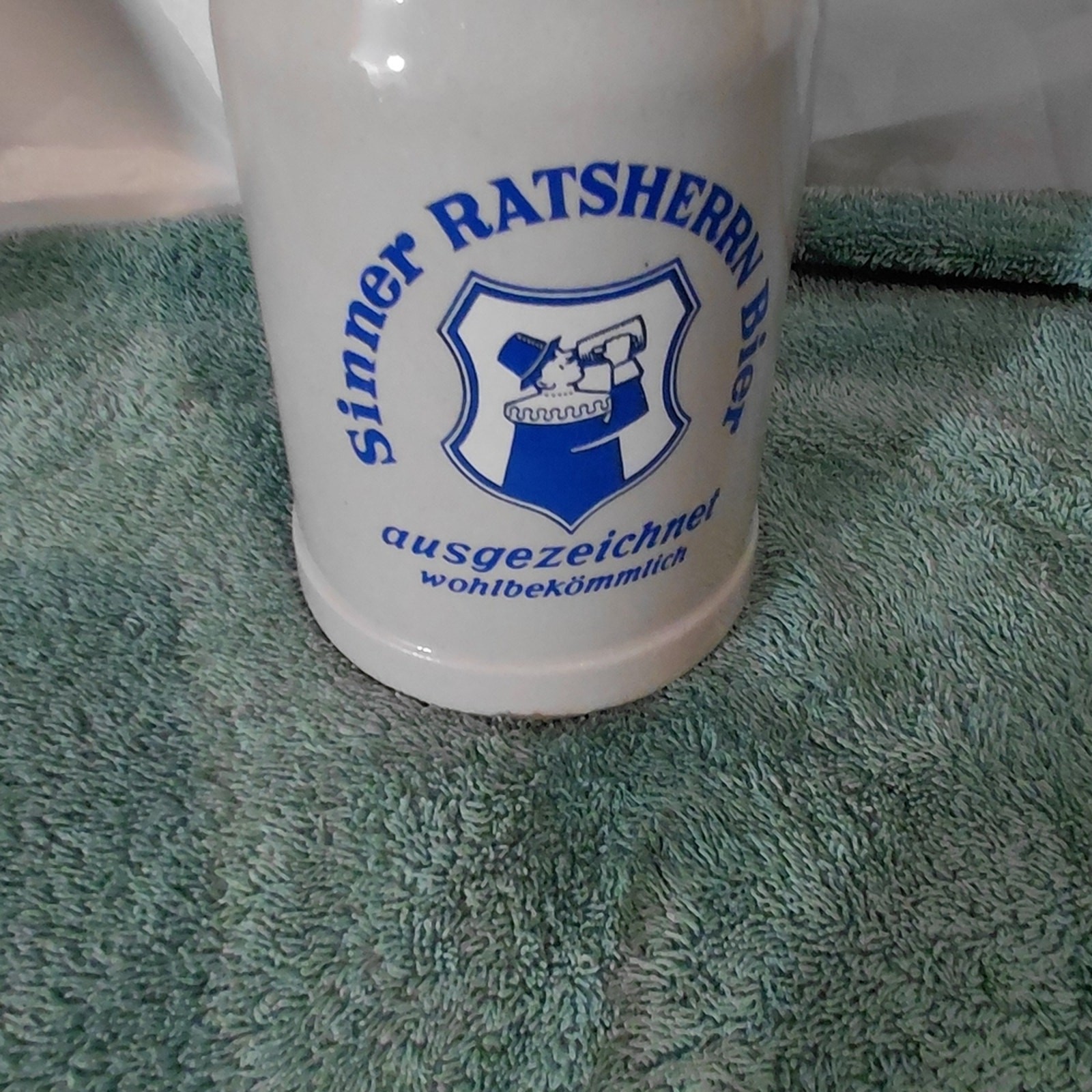White Ceramic Beer Stein with Blue Crest
