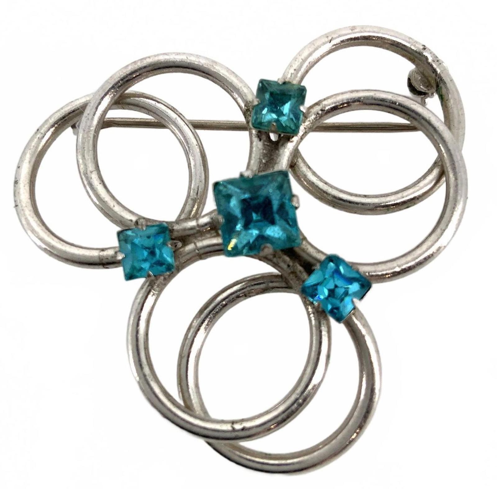 Vintage Silvertone Blue Crystal Mid Century Brooch Interlocking Circle Pin