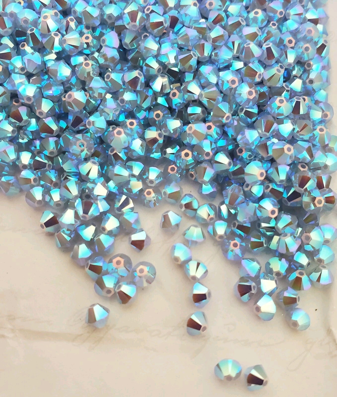 Swarovski 5328 4mm bicone beads, Air Blue Opal AB2X (24pcs)