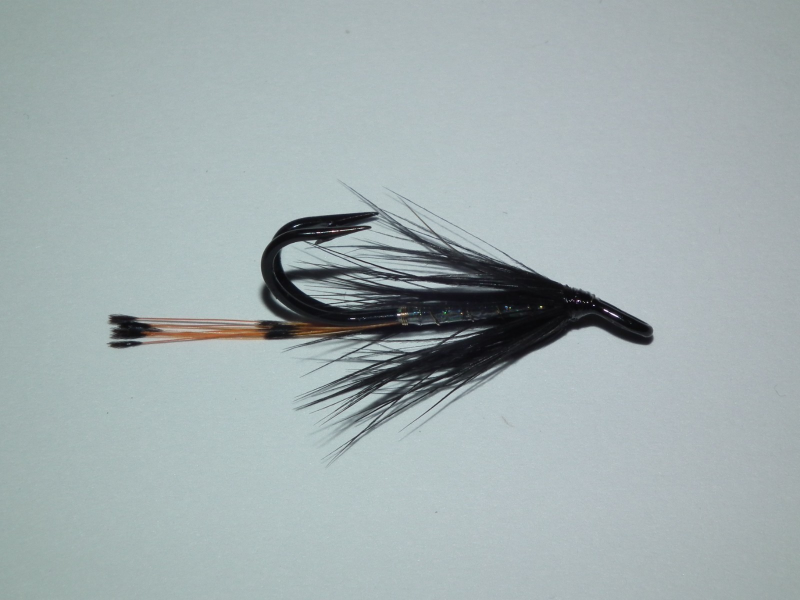 salmon/seatrout flies ---- 3 black & silver tied on veniard size 8 double hooks
