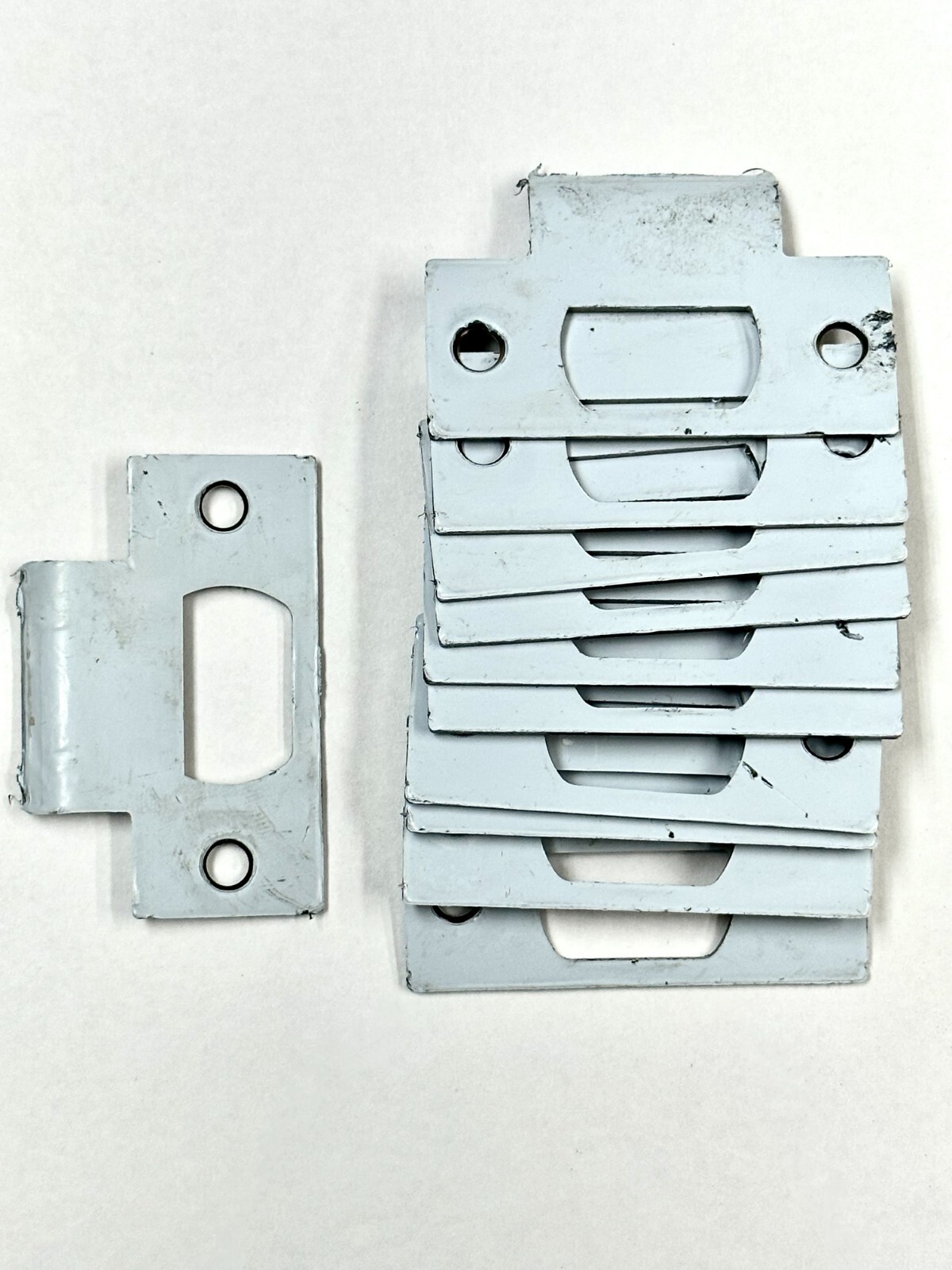 (5 PACK) UNBRANDED 2-3/4" DOOR T-STRIKE, STILL HAS PROTECTIVE COVERING, NEW