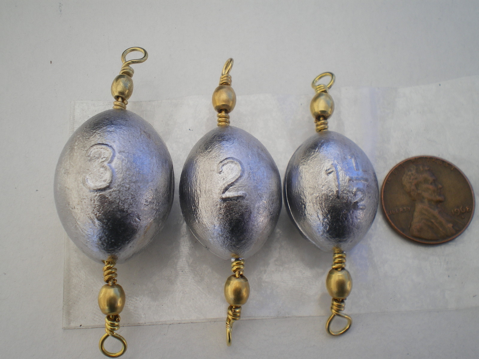 45 PCS. #5 BRASS SWIVEL EGG SINKERS 1-1/2, 2, 3 OZ. 15 EA. G/QUALITY "STRIPER"