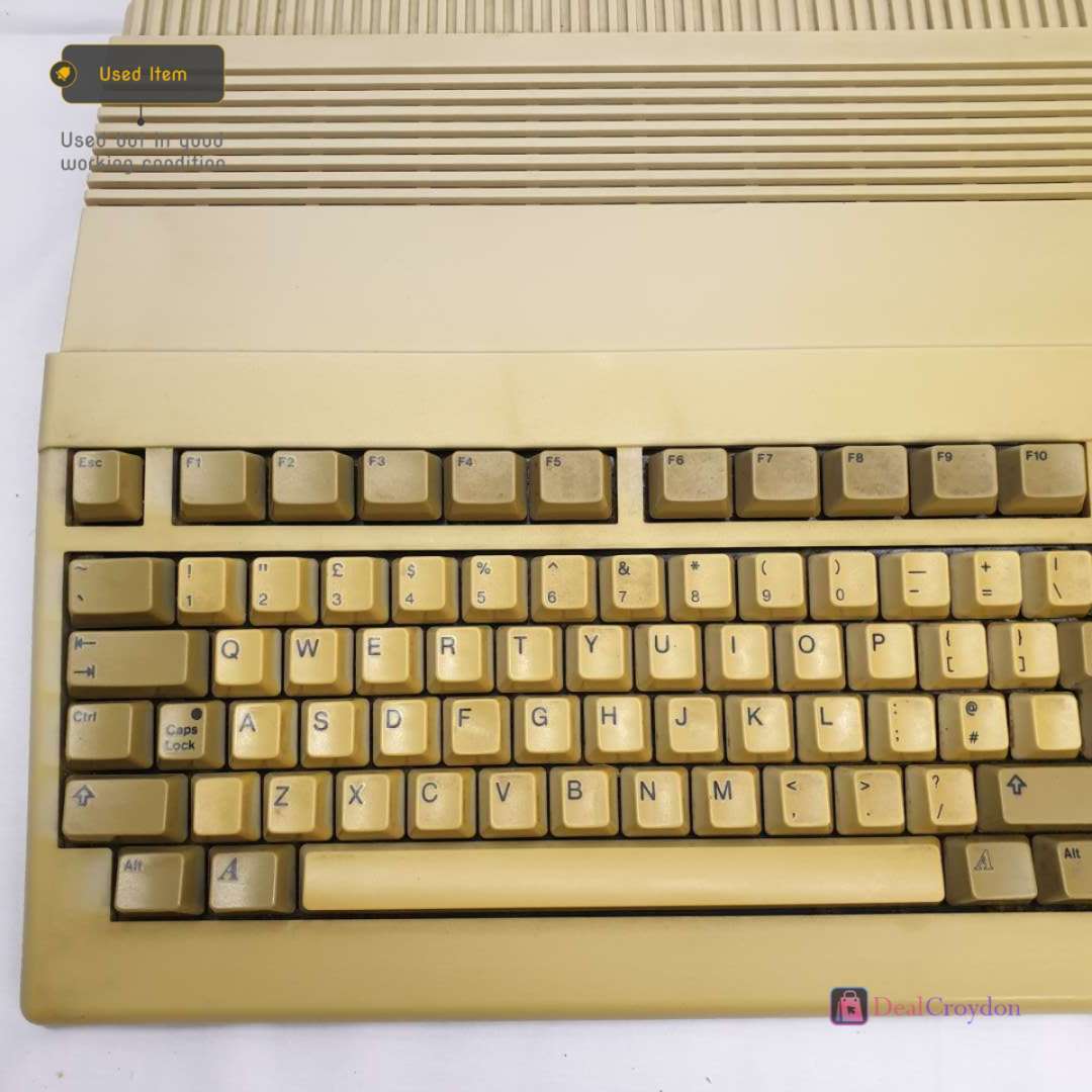 COMMODORE AMIGA A500 COMPUTER +COMMODORE A520 +MOUSE + 10 DISKS + POWER SUPPLY
