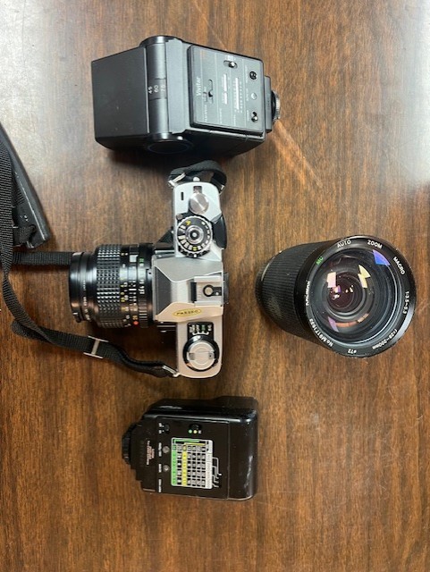 Minolta HG1 camera and lens set with Sunpak auto 221D and Vivitar 550 FD flash