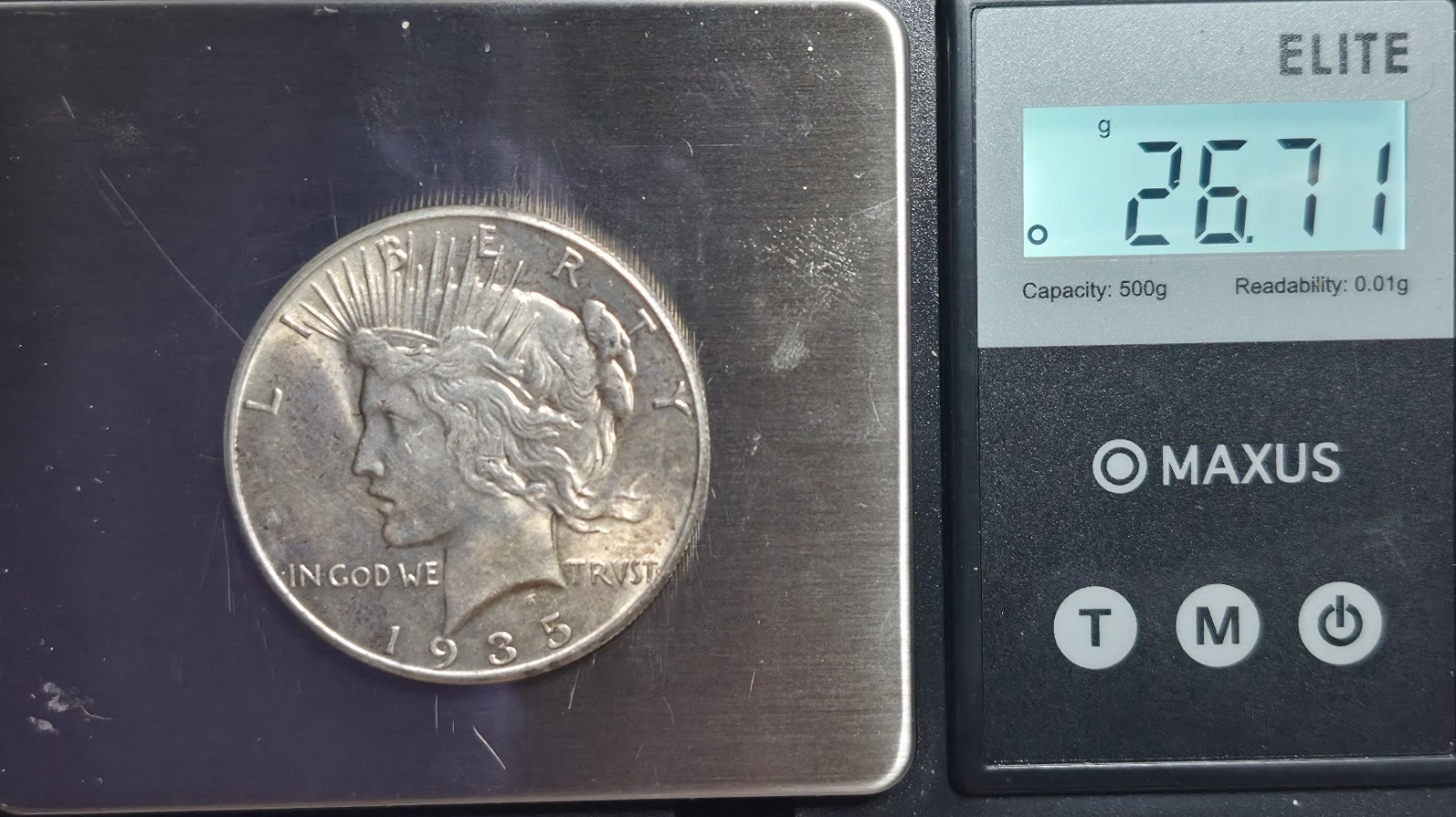 1935 P Peace Silver Dollar. Estimated Almost Uncirculated 58. A0989.