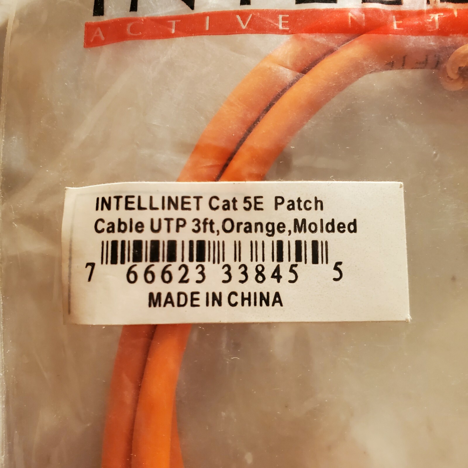 Intellinet Network Solutions Cat5e UTP Network Patch Cable, 3 ft (1.0 m), Orange